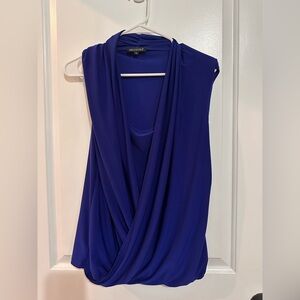 For Cynthia Royal blue women’s sleeveless blouse. Size large. Smoke free home.